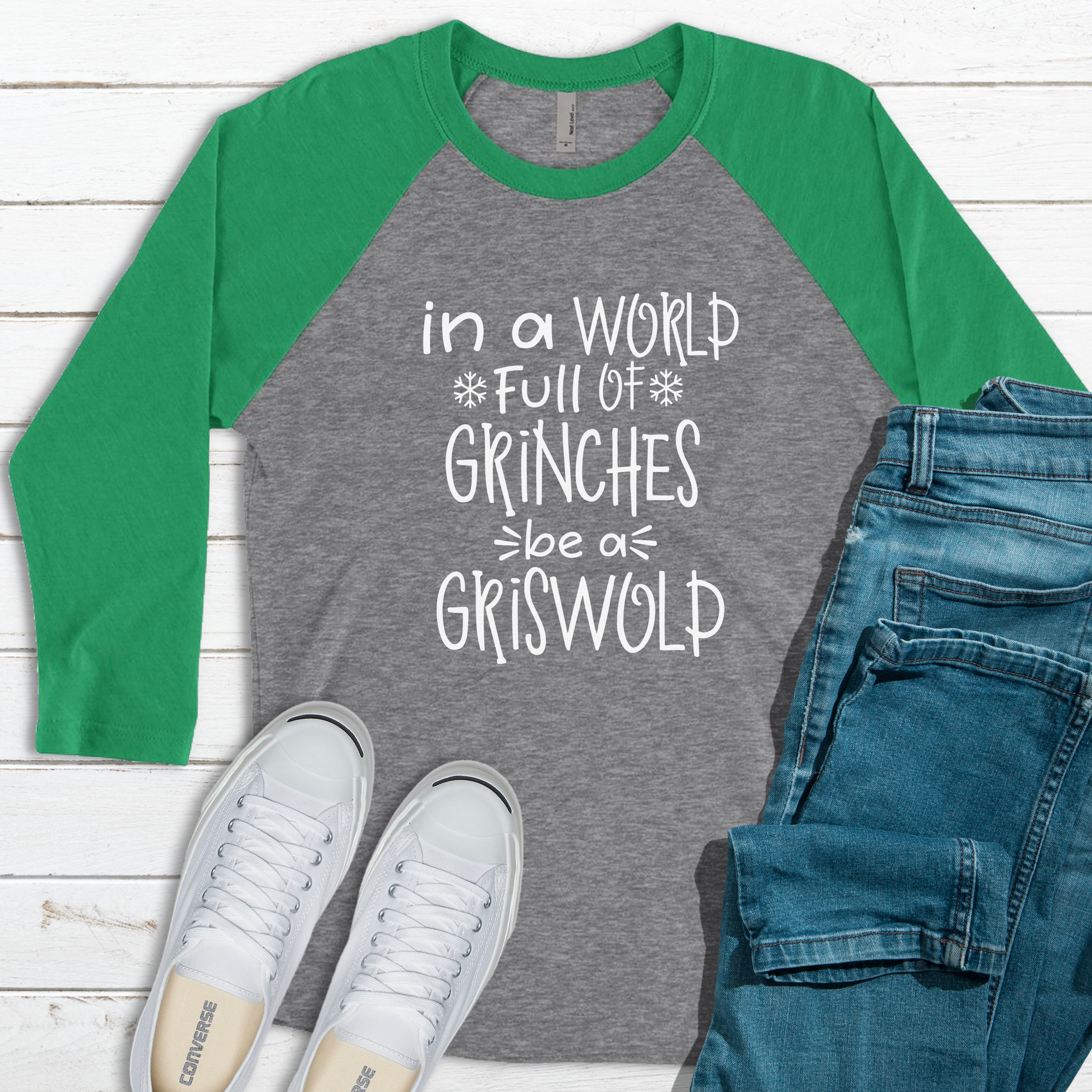 In A World Full of Grinches Be A Griswold Raglan Tee